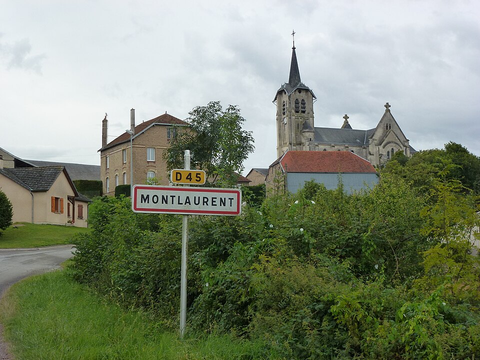 Mont — Laurent (Ardennes) city limit sign and church