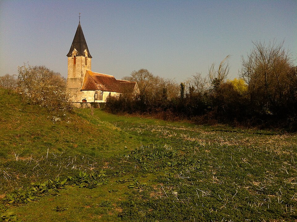 Church in Bailleul with motte in foreground