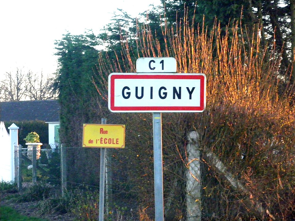 Guigny — Panneau d'entrée