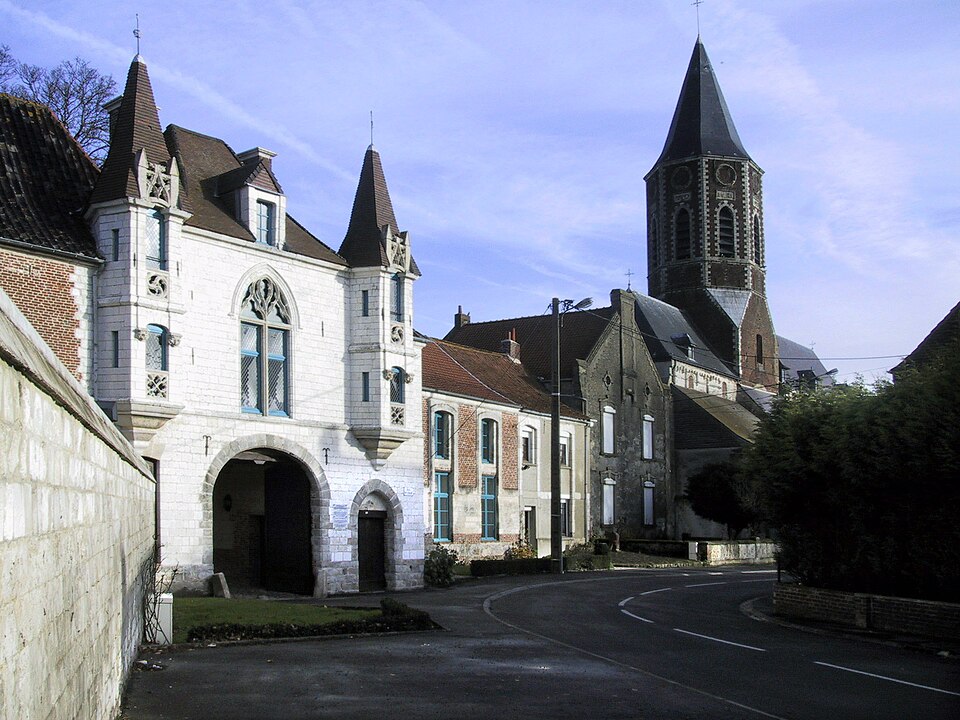 Abbey gateway and church, Ham — en — Artois, France