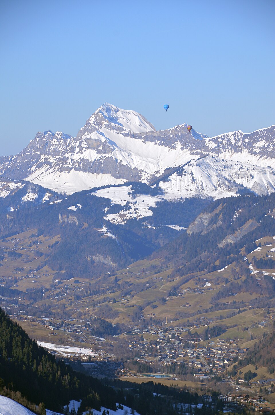 Remote view of Praz — sur — Arly and Mont Charvin, with hot air balloons, from Mont d'Arbois, Saint — Gervais — les — Bains, 2025