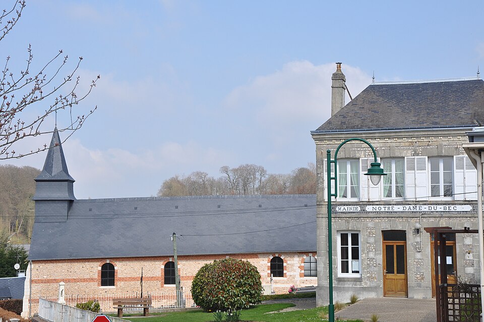 Church and town hall of Notre — Dame — du — Bec (France)